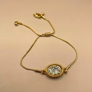 Charming Charlie adjustable bracelet with oval glitter crystal stone signet